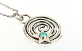 Universal Spiral Pendant Handmade in Sterling Silver with Turquoise Bezel Set Cabochon In the Centre of A Shining Star